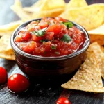 Chili-Salsa mit Tortilla-Chips First Image First Image
