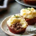 Hackfleisch-Muffins mit Kartoffelpüreehaube First Image First Image