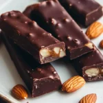 Vegane Schokoriegel mit Mandeln und Karamell First Image First Image