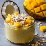 Mango-Joghurt mit Kokos und Haferflocken First Image First Image