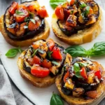 Bruschetta mit gerösteter Aubergine und Tomaten – Mediterrane Köstlichkeit First Image First Image