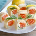 Lachs-Sandwichröllchen First Image First Image