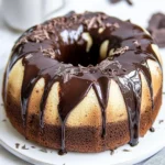 Saftiger Marmorkuchen mit Schokoglasur First Image First Image