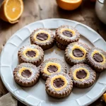 Spitzbuben mit Schokolade und Orangencurd First Image First Image
